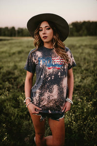 Unisex Patrotic hand bleech blue t shirt with American Eagle and American flag that spells FREEDOM great for the the fourth of July front.