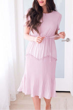Woman wearing light pink plush Tea N Rose modest midi short sleeve dress front.