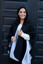 Reversible women's black and gray shawl poncho style side.