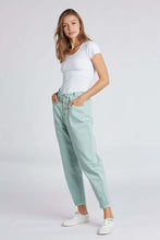 Green Relax Fit Jean Pants styled with white sneakers