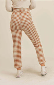 Back view of tan and cream checkered plaid high-rise pants