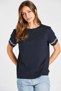 Woman wearing navy blue short sleeve t shirt front.