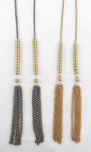 Chain and tassel homemade wrap around necklace made from Restrung Jewelry in gold and mix metal. 