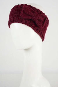 Dark red knitted headband with bow