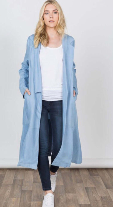 Women's light blue duster length jacket with pockets front.