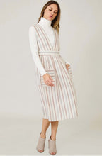 Women's deep V neck sleeveless stripped dress with front pockets front.