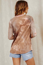 Women in long sleeve pink brown cream colored tie dye lightweight top back.