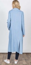 Women's light blue duster length jacket with pockets back.