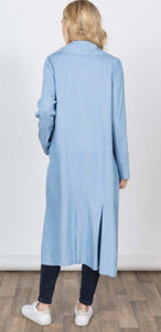 Women's light blue duster length jacket with pockets back.