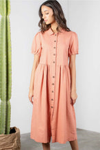 woman wearing dusty salmon button down midi modest dress with sleeves front. 